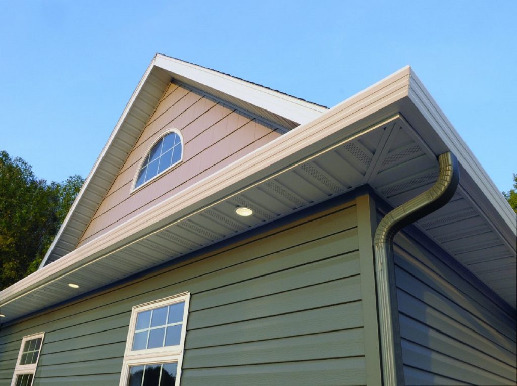 Fascia and gutter painting on a Logan home